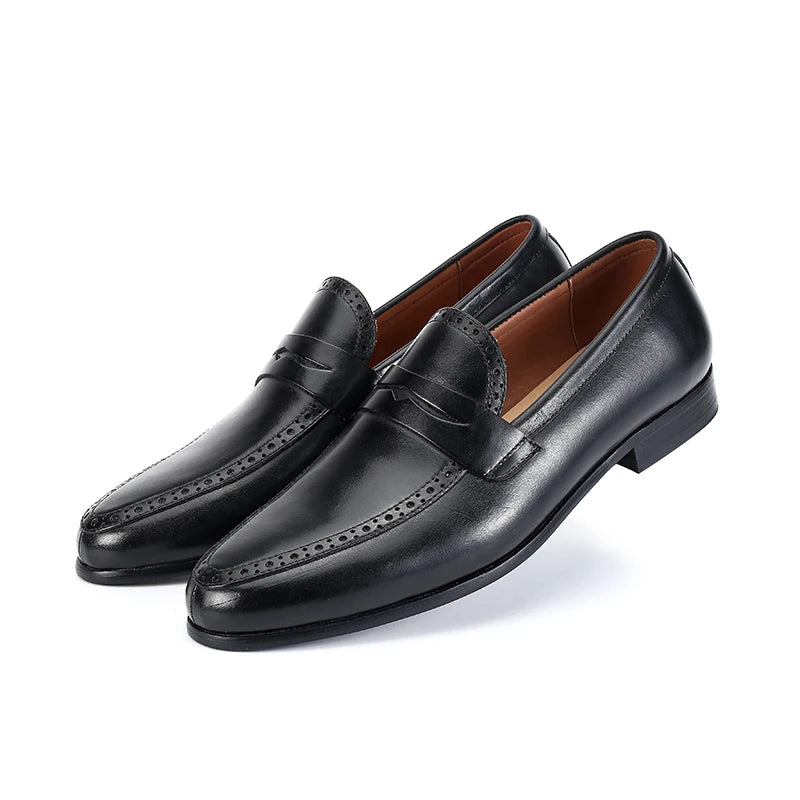 Julian's |Close-up of a Black leather shoe sole with brand logo on a white background