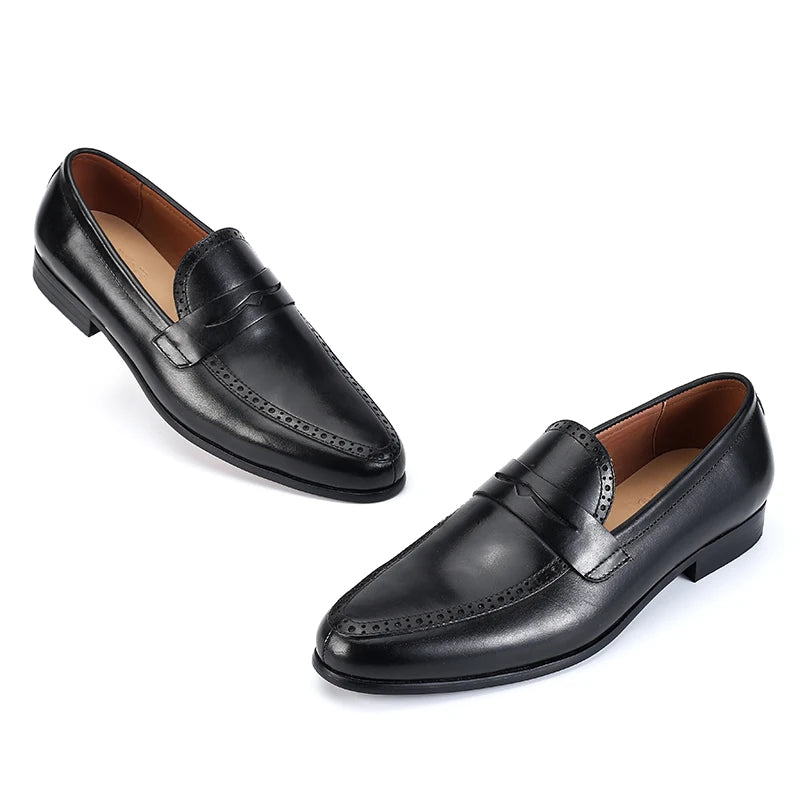Julian's |Pair of black leather loafers on a white background2