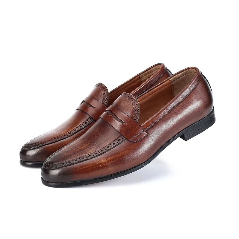 Julian's |Pair of brown leather loafers on a white background3